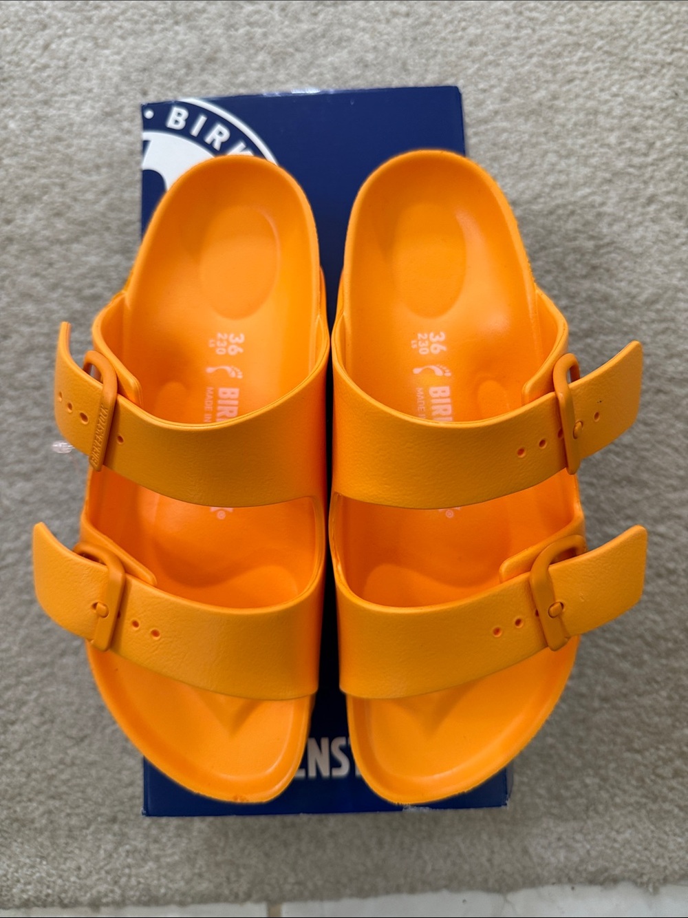 Birkenstock women’s Bright Orange EVA Two-Strap Sandals